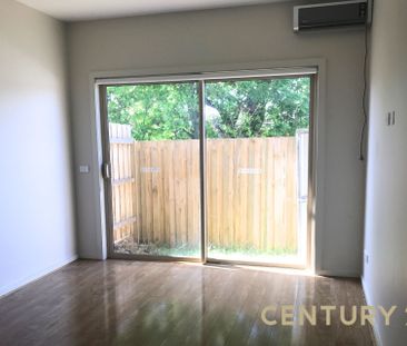 Spacious Townhouse with Private Balcony & Lock-Up Garage - Photo 4