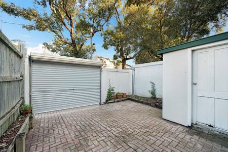 Centrally Located Three Bedroom Home | 6 month lease - Photo 5