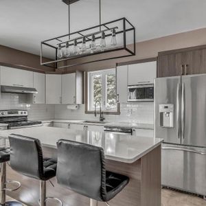 En face de l'université Laval - Photo 2