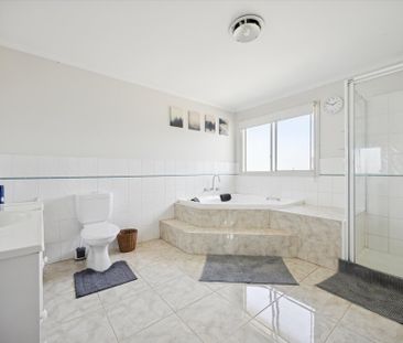 Secure Family Home with Solar & Multiple Living Zones - Photo 5