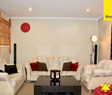 This immaculate four bedroom home is both private and welcoming and... - Photo 6