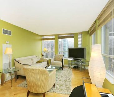 Cheerful 2 Bedroom with 2 Bathrooms plus Balcony and Hardwood Floors - Photo 2