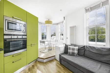 A modern two bedroom apartment set on the first floor of a residential building in Golders Green. - Photo 3