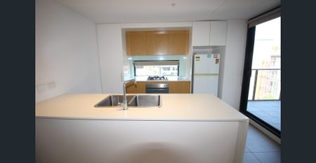 Conveniently Located Mid Level Modern Apartment with Pleasant Views & Complex Facilities - Photo 5