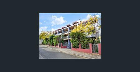 Sophisticated Urban Living - Split Level One Bedroom Apartment - Photo 2