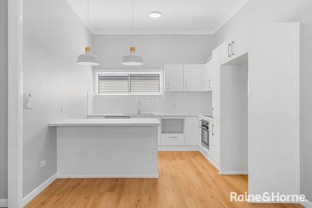 Beautifully Renovated 4 Bedroom Home in Prime Location complete with partial water views! - Photo 2