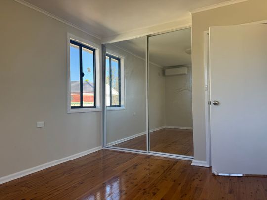 RENOVATED 4 BEDROOM HOUSE - Photo 1