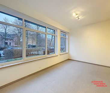 Gerenoveerd gelijkvloers appartement met tuin en garage - Photo 3