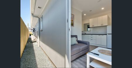 NEAR NEW FULLY FURNISHED, DESIGNER STUDIO APARTMENT – BILLS INCLUDED! - Photo 2