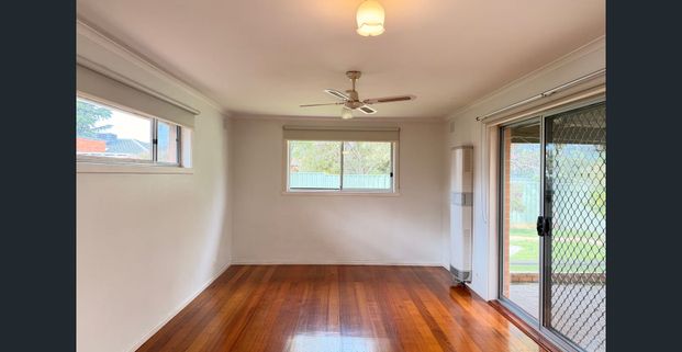 Neat & Tidy Family Home with Spacious Outdoor Entertaining! - Photo 1