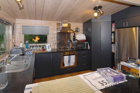 This very tidy two level home offers comfortable and convenient living close to Hamilton City Central and FMG Stadium. - Photo 5