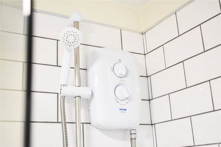 A three bedroom detached family home with an integrated garage and driveway parking in Leighton. - Photo 5