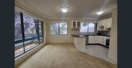 Spacious North Facing Three Bedroom Residence With Lockup Garage and Great Natural Light - Photo 3