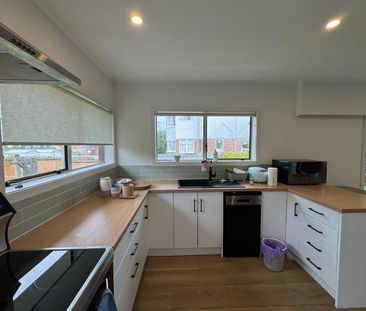 Fully Furnished End-Unit with Spacious Outdoor Living - Photo 6