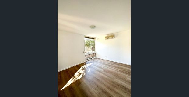 Low maintenance two-bedroom unit in convenient location - Photo 1