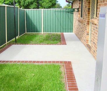 Three-Bedroom Home in Sought-After Albion Park Location - Photo 4