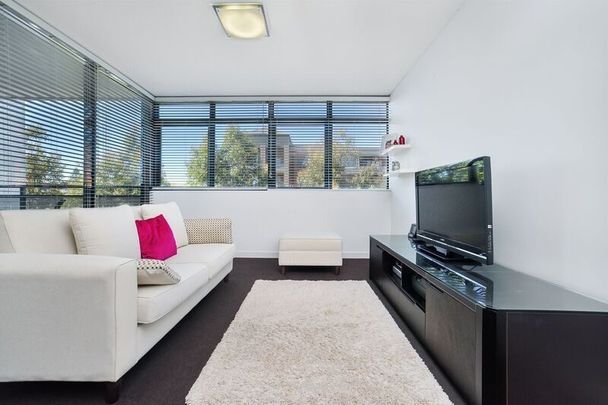 Spacious One-Bedroom Blending Style and Comfort - Photo 1