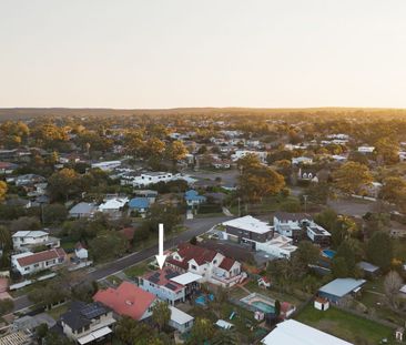 Charming Family Home with Swimming Pool in Convenient Locale - Photo 4