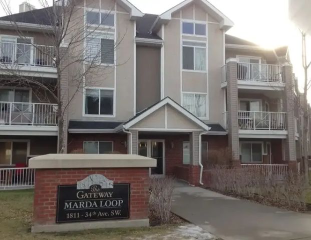 A 2-Bedroom 2-Full Bathroom Condo (Corner Unit) For Rent In Marda Loop | 107 - 1811 34 Avenue SW, Calgary - Photo 1