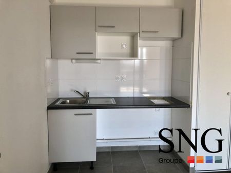 T2 AVEC LOGGIA ET UN PARKING INTERIEUR - Photo 2