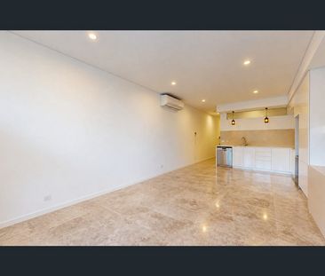 Modern Apartment in a Convenient Riverside Location! - Photo 1