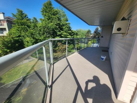 Spacious Two Bed Condo in Langley with Parking and Storage - Photo 4