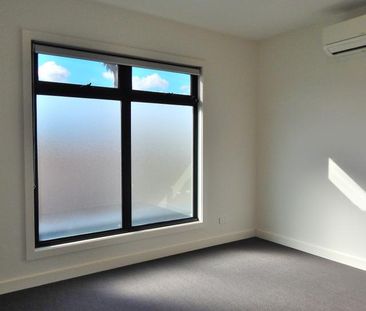 Modern Spacious and Close to a Host of Amenities! - Photo 6