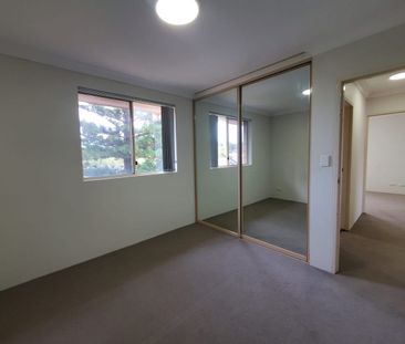 Penthouse Style unit | Great Location | Lock up garage - Photo 2