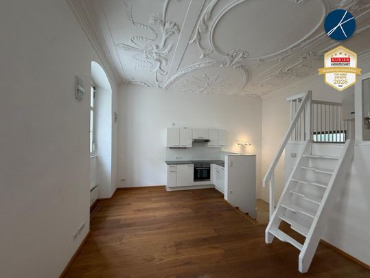 Stilvolle Galeriewohnung mit einzigartigem Altbauflair - Foto 1