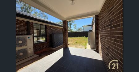 Brand New 4 Bedroom Home, Located In Austral! - Photo 4