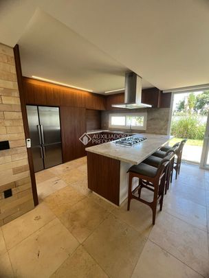 Casa em Condomínio com 4 quartos e 350m² para alugar em Campeche, Florianópolis. - Photo 1