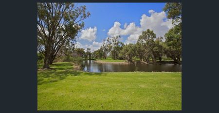Beautiful Two-Bedroom Unit in Serene Surroundings - Photo 3
