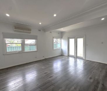 SPACIOUS THREE BEDROOM HOME IN A SOUGHT AFTER LOCATION - Photo 1