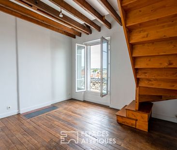 Duplex atypique en dernier étage - Photo 1