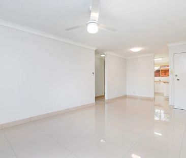 Inner-City Convenience with Spacious Living & Balcony Retreat - Photo 2