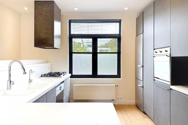 Maison rénovée (+-196m²) - 3 chambres avec terrasse et jardin. - Photo 1