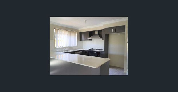 Three Bedroom Family Home - Photo 1