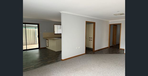 Neatly Maintained Family Home with Semi Open Plan Living and Outdoor Entertaining - Photo 1