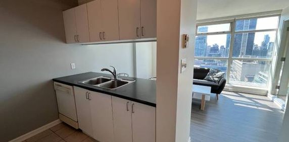 1 bd + den apartment for rent - Photo 2