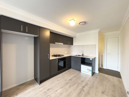 Stylish Three - Bedroom Home in Premier Gregory Hills Location - Photo 4