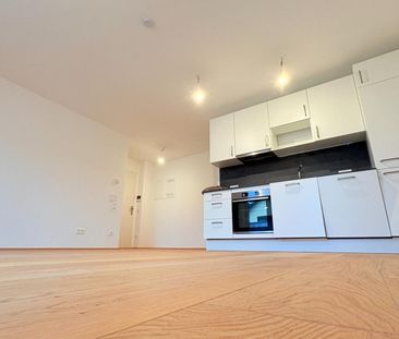 Balkonwohnung mit höchstem Wohnkomfort und modernster Küche auf 1,5... - Foto 3