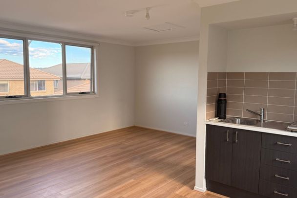 CONVENIENTLY LOCATED STUDIO APARTMENT - Photo 1