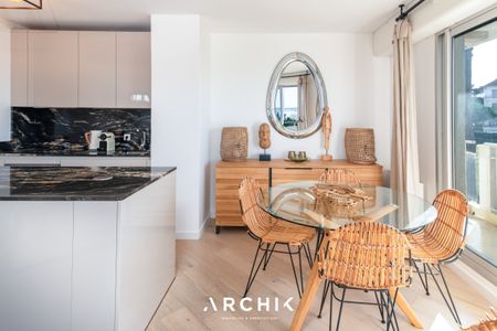 Architecture contemporaine, cet appartement de 60 m2 situé au premier étage d'une résidence standing installée au coeur d'un parc paysager, offre un accès direct à la plage du Moulleau. - Photo 4