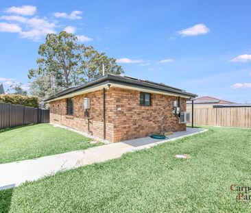 Charming 3-Bedroom Flat with Enclosed Yard and Carport. - Photo 6