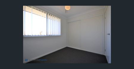 Modern three bedroom unit, close to amenities. - Photo 3