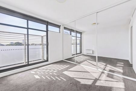 Stylish St Kilda Living with Rooftop Entertaining & Sweeping City Views - Photo 2