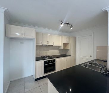 FIVE MINUTE WALK TO SHOPS - Photo 6