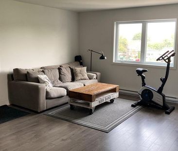 4 1/2 à louer Charlemagne 1er déc - Photo 1