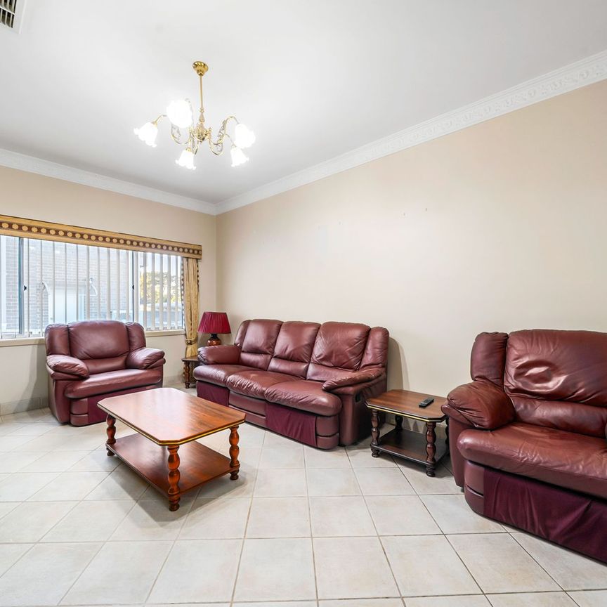 SINGLE LEVEL ENTERTAINER WITH HUGE 4 CAR GARAGE - Photo 1
