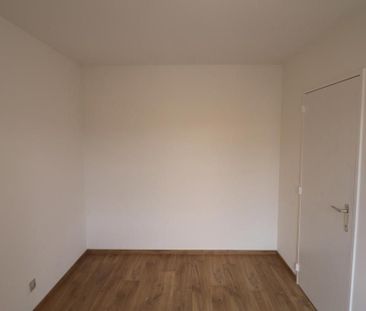 Een gerenoveerd appartement op de eerste verdieping achteraan met a... - Photo 5